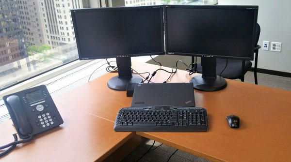 Desk With Computer and Phone